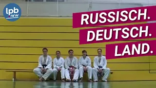 Russisch. Deutsch. Land.