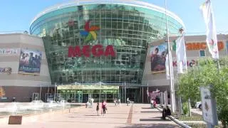 Girl dancing to Beatles muzak, Astana, Kazakhstan