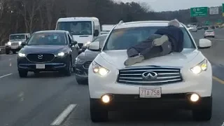 Police: Man drove on Mass. Pike with person clinging to hood during road rage incident