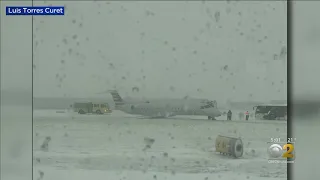 Plane Slides Off Runway at O'Hare