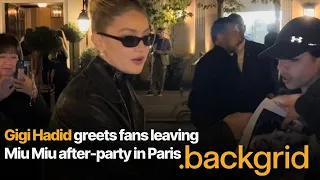 Gigi Hadid greets fans leaving Miu Miu after-party in Paris