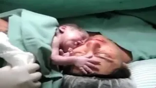 Nurse put the healthy Baby next to his dying Mom and a real miracle Happened!