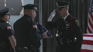 Officials present flag to fallen Officer Seara Burton's family