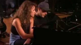 Mariah Carey and Walter Afanasieff composing a song together.