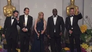 Brad Pitt talks '12 Years a Slave' backstage at the Oscars