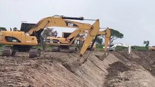 CAT Excavator 320CU Loading Dumpers Build CANAL And  Dump Trucks unloading