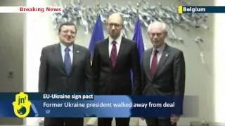 Ukraine and EU sign landmark association agreement amid crisis with Russia