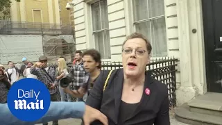 Moment Eddie Izzard's hat is stolen during EU protest - Daily Mail