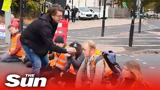 Insulate Britain: Driver hurls ink in faces of protesters