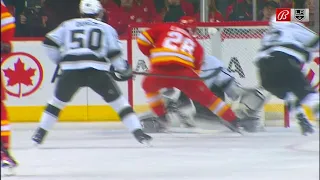 Jonathan Quick makes a save on Elias Lindholm's breakaway attempt.