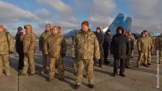 Ukraine president visits troops heading to Russian border