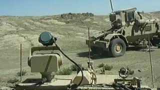 Husky in front hits an IED