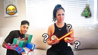 SURPRISING MY GIRLFRIEND WITH REALLY BAD CHRISTMAS GIFTS...**CUTEST REACTION**