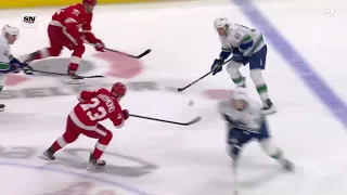 Nikita Zadorov hits Lucas Raymond and he goes down with an injury