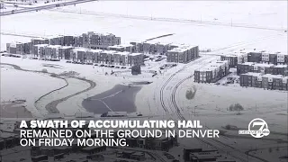 Swath of hail covered the ground in Denver Friday morning
