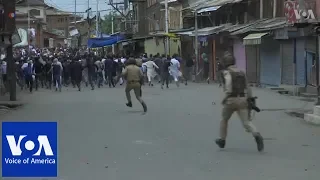 Police clash with protesters in Kashmir