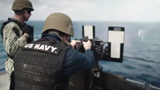 Sailors fire M2A1 .50 caliber machine gun