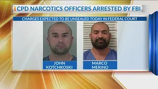 Two Columbus police narcotics officers arrested by the FBI