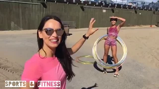 Most Hula Hoops Spun Simultaneously On High Heeled Roller Skates!