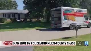 Man shot by officers amid chase involving stolen U-Haul