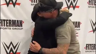 Shawn Michaels and The Undertaker Hug at WWE Wrestlemania 38 Axxess RARE