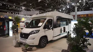 Motorhome with height adjustable queen bed.  Hobby Optima de Luxe T70HGQ.