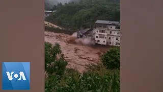 Building Collapses Amid Floods in China | VOA News