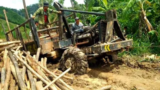 Car accident at wood market in rainy season, dangerous slippery roads