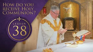 How do you receive Holy Communion?