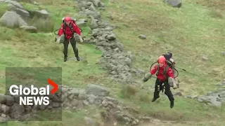 Paramedic in Iron Man-style jet suit battles wind, rain during mountain training