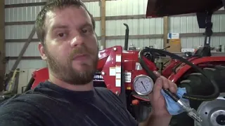 Testing tractor loader hydraulic pressure, adjusting pressure