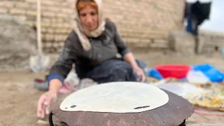 Cooking Tiri bread on a snowy day in the village of Iran: village cooking #village#bread#cooking