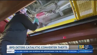 Catalytic converters are spray painted, marked in hopes of deterring thieves