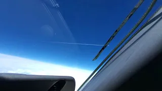 Air to Air Shot of Jet Aircraft Passing Each Other at FL430 (43,000 ft)