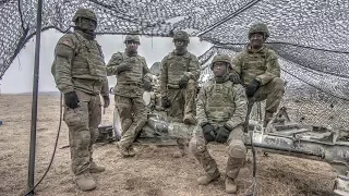 Army Paratroopers Conduct Fire Mission With M119 Howitzer