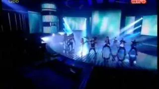 Ashley dancing behing Kelly Rowland in Down For Whatever(X Factor UK 2011)