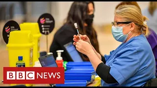 UK hit by vaccine shortage with new bookings put on hold - BBC News