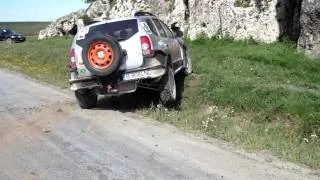 Dacia Duster off road up the hill  designed by Mudster Romania