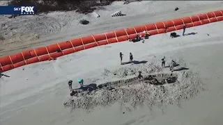 Buried treasure? Old shipwreck washes up on Florida beach