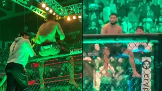 Khamzat Chimaev & Darren Till dancing sitting on the cage during Gilbert Burns' entrance