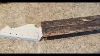The Process Of Gluing A Fretboard Onto A Neck!