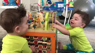 IDENTICAL TWINS LAUGHING