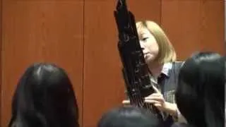 Asian girl plays Super Mario theme on a Sheng (and it sounds awesome!)