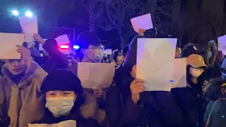 Protest against Covid measures continues late into the night in Beijing | AFP