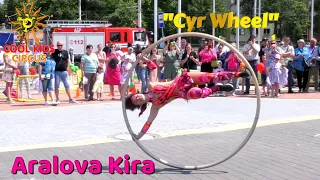 Demonstration performance on the streets of Minsk, young acrobat "Cyr Wheel" - Aralova Kira.