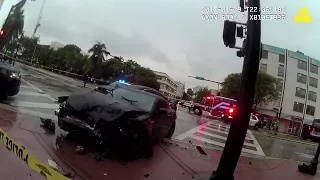 Police bodycam video shows pursuit ending with car crashing into bus