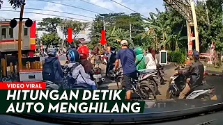 Detik-detik Pengendara Motor Tak Sabar Terobos Perlintasan Rel Kereta Api, Auto Menghilang