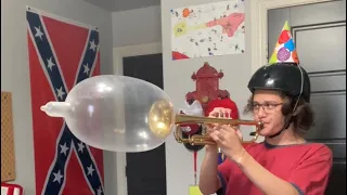 Inflating A Condom Up With A Trumpet