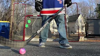 Shooting hockey ball at targets