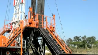 Workover rig and supporting equipment work stably